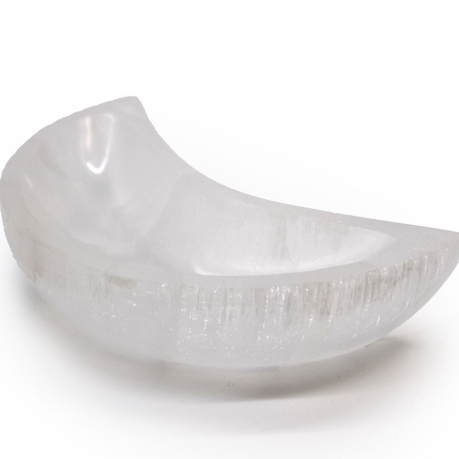 White ceramic bowl with textured surface on a white background