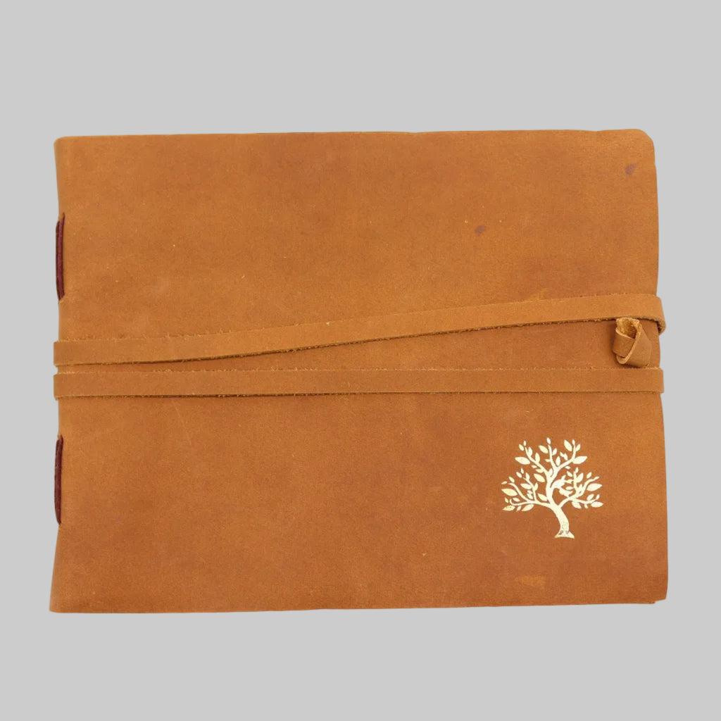 Brown fabric pouch with a white tree design on a white background