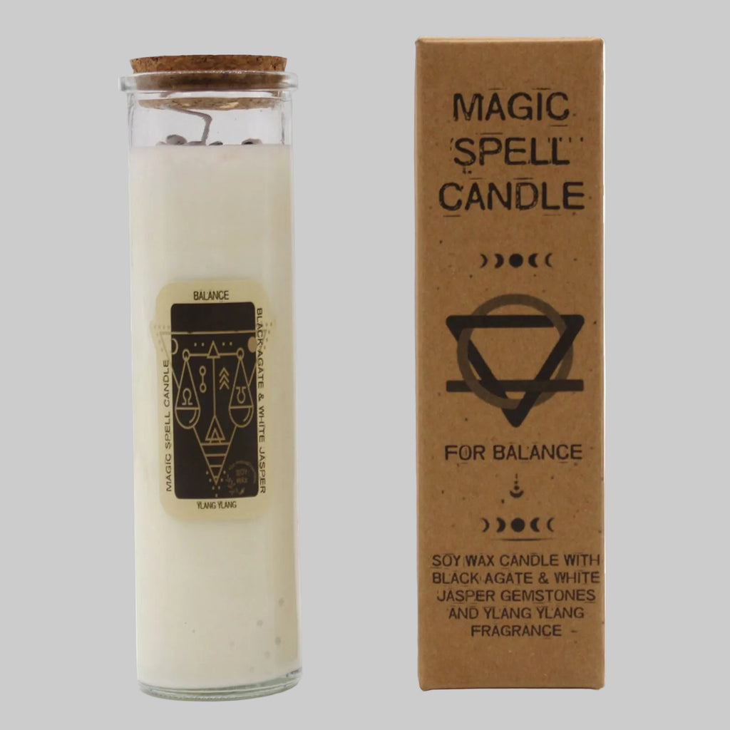 Magic spell candle with packaging on a white background