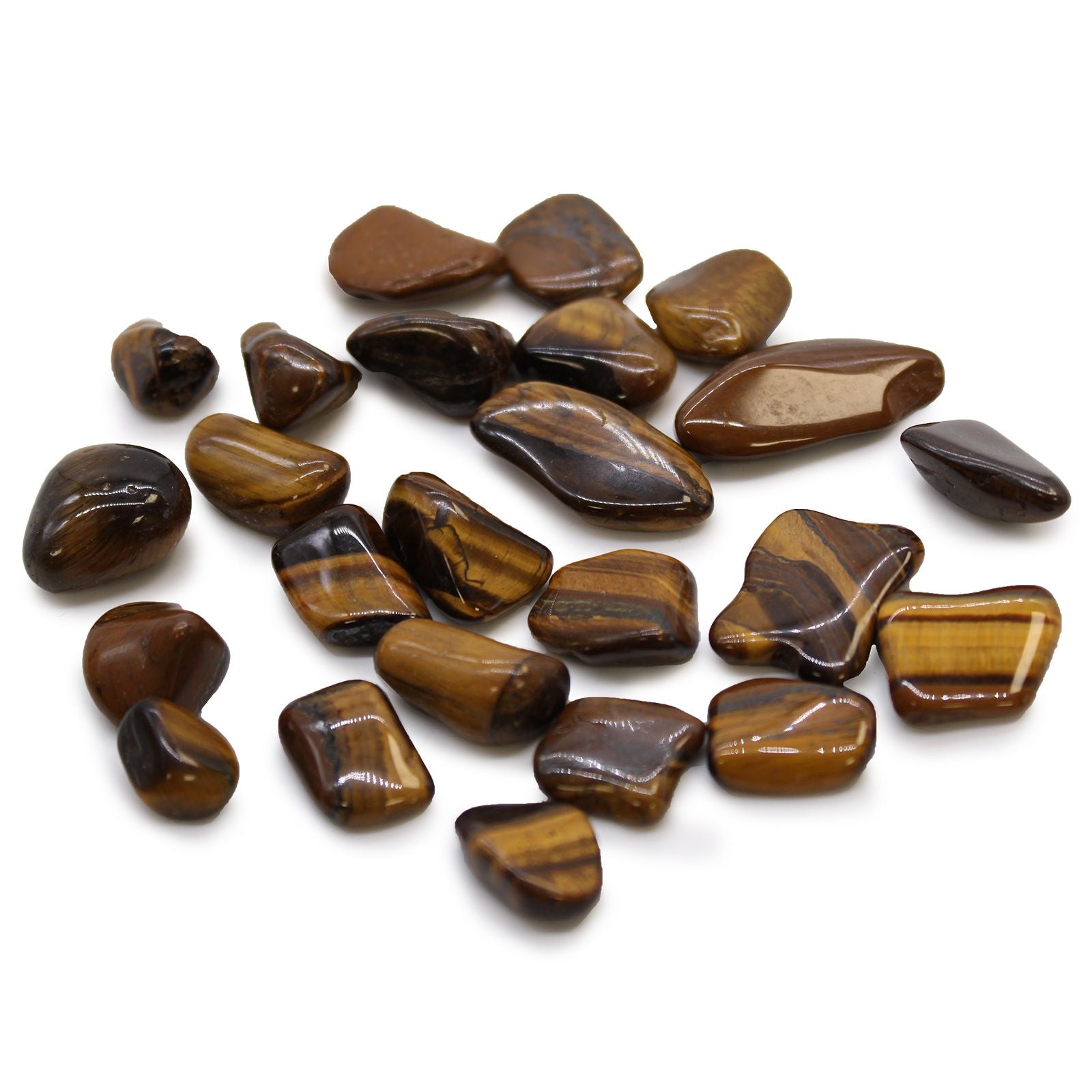 Collection of brown tumbled stones on a white background
