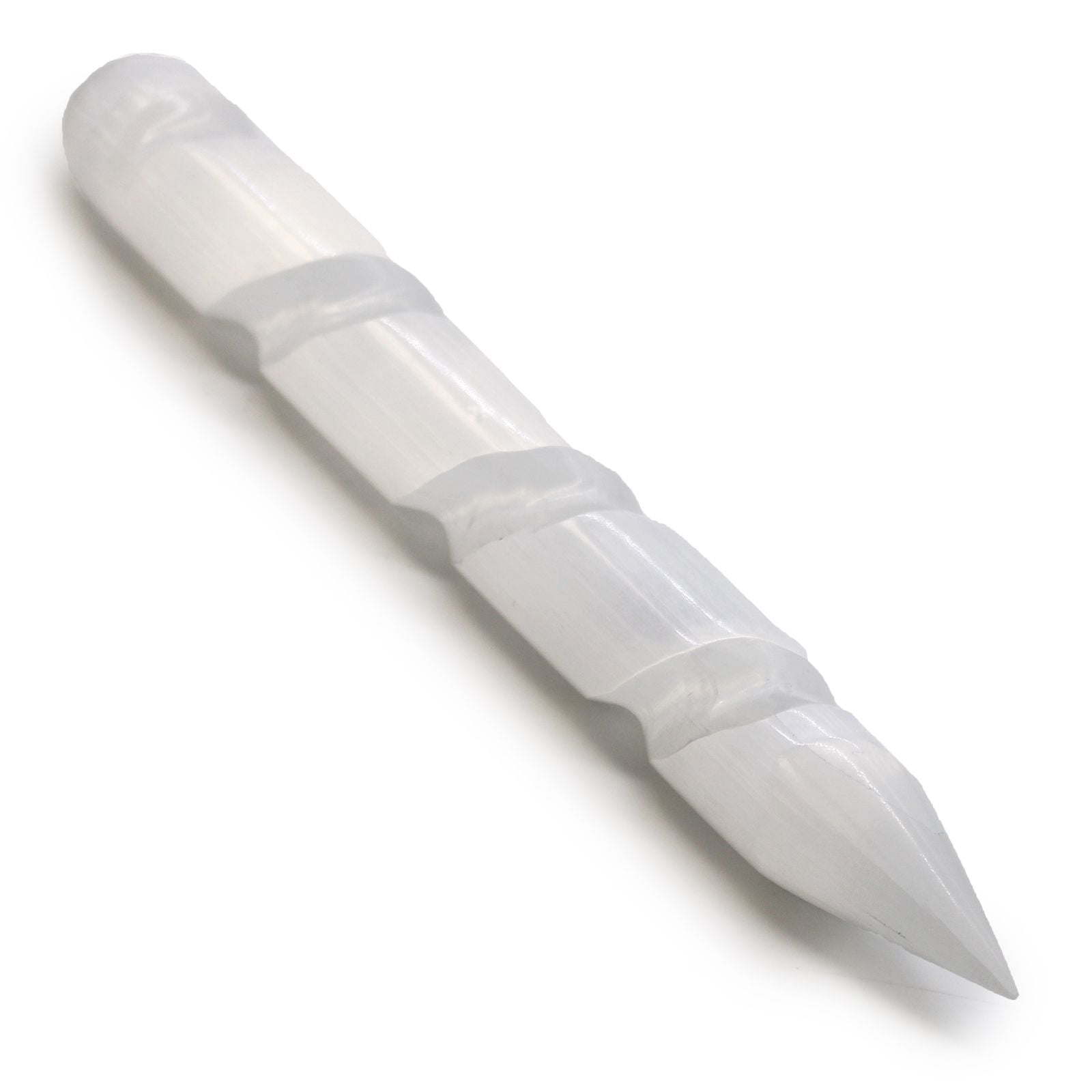 White pen with a pointed tip on a white background