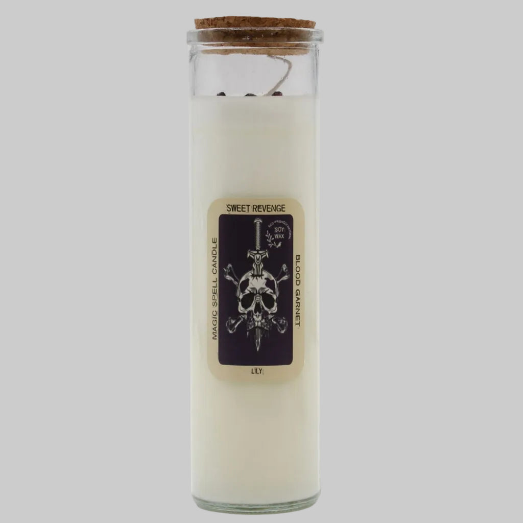 Glass candle with a label featuring a skull design on a white background