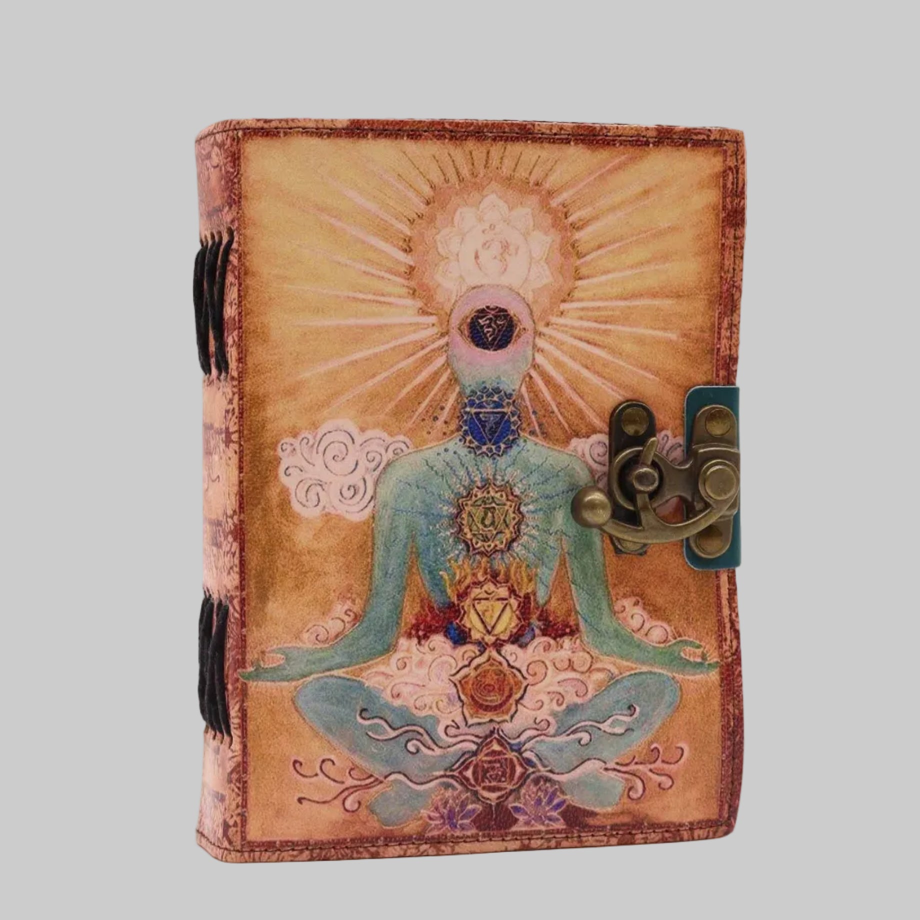 Decorative notebook with a meditating figure design on a white background