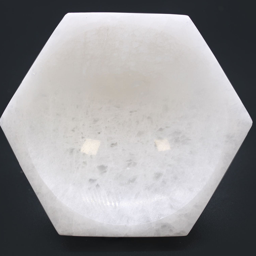 Hexagonal stone lamp on a black background