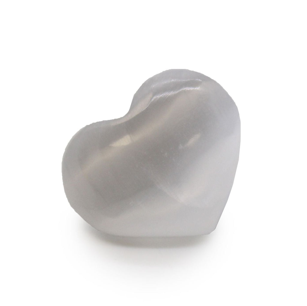 Heart-shaped stone on a white background