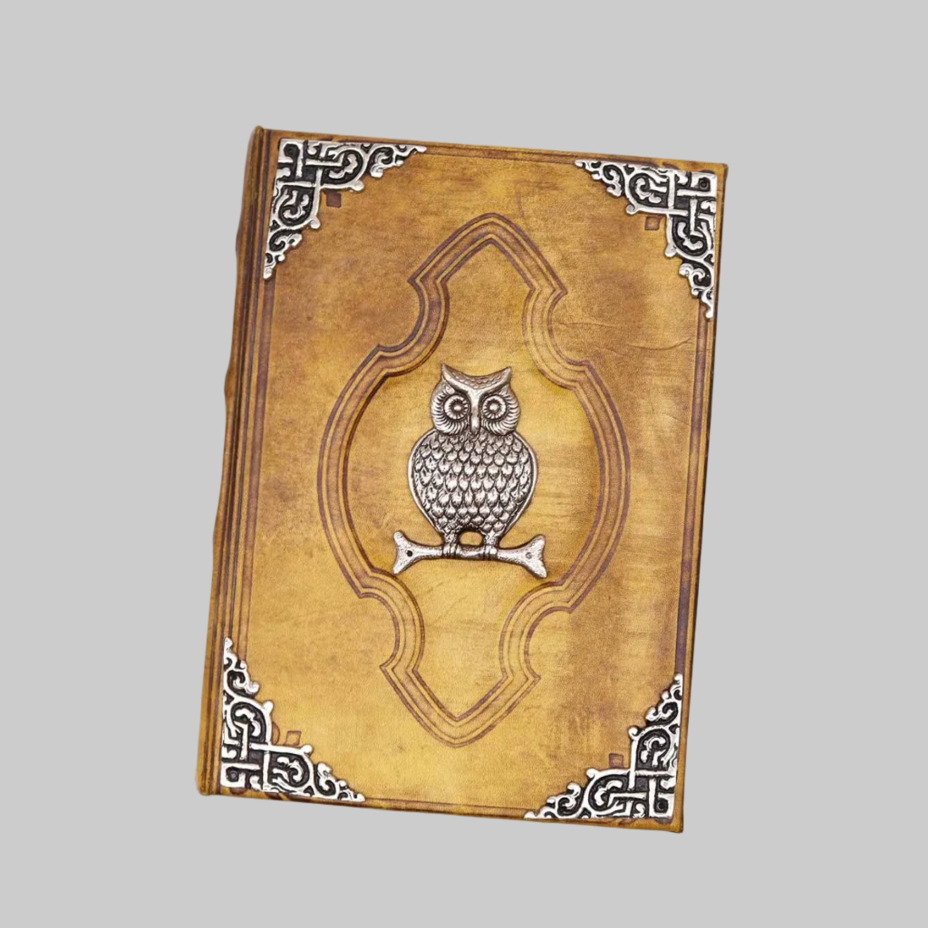 Decorative notebook with owl design on a white background