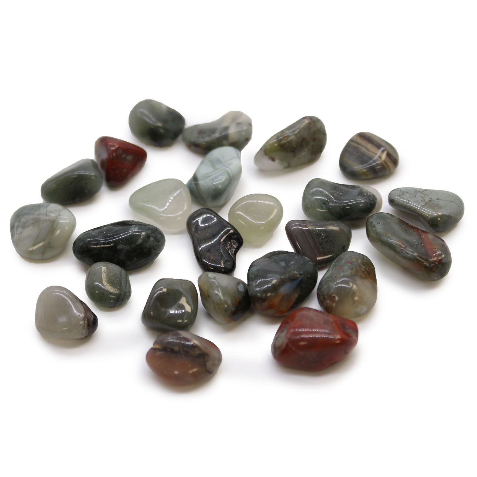 Assorted colored stones on a white background