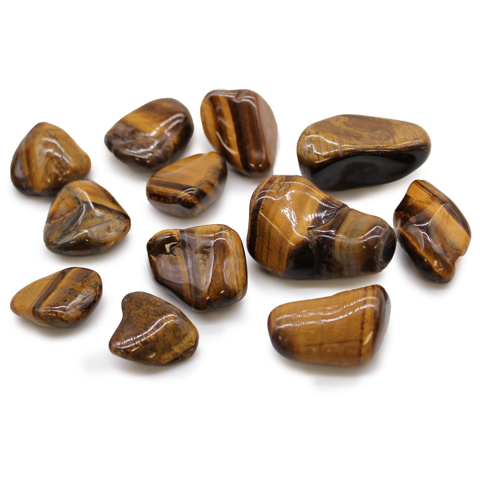 Collection of tiger eye stones on a white background