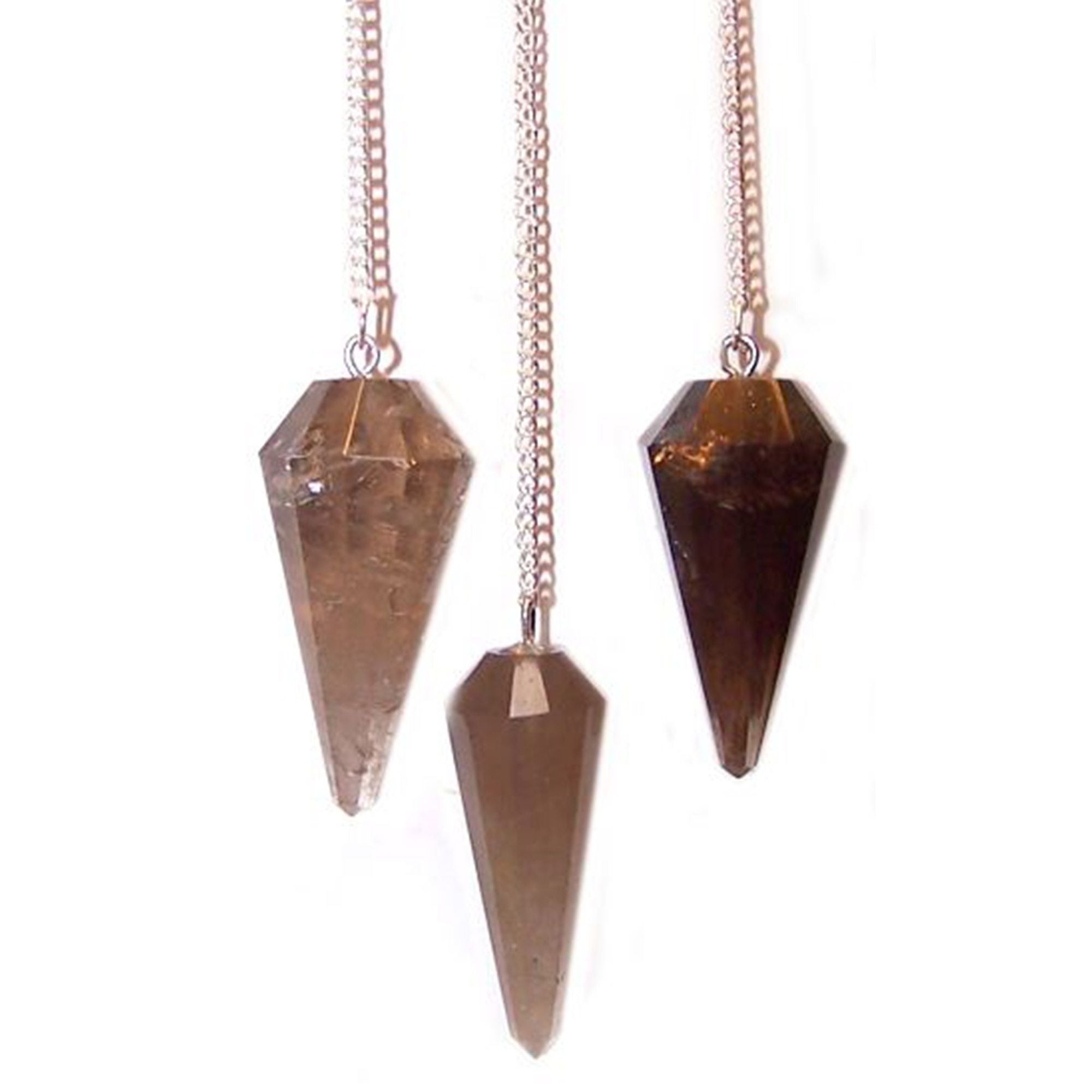 Three crystal pendulums on rose gold chains against a white background