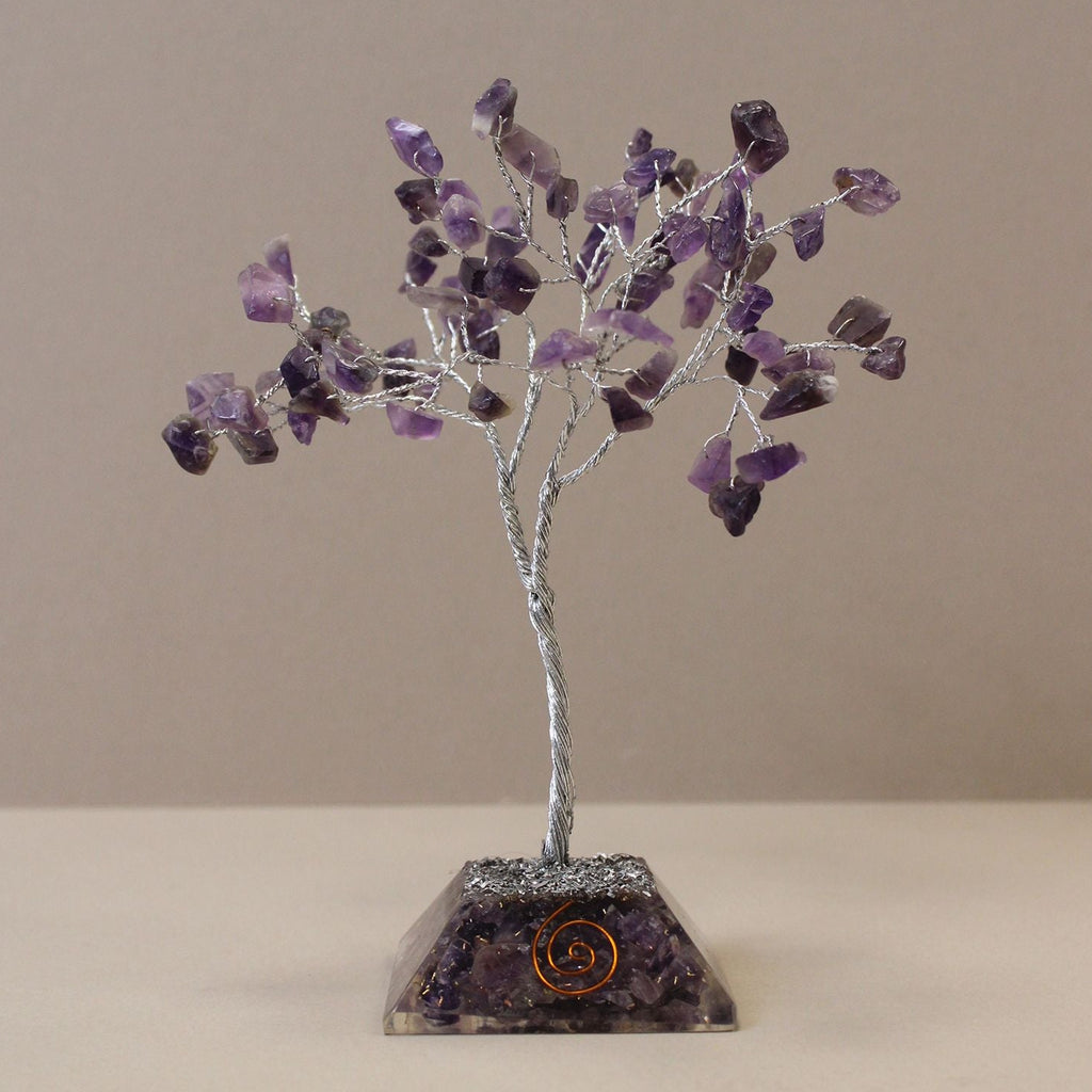 Amethyst crystal tree on a beige background