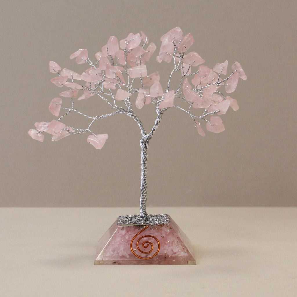 Decorative tree with pink leaves on a brown background