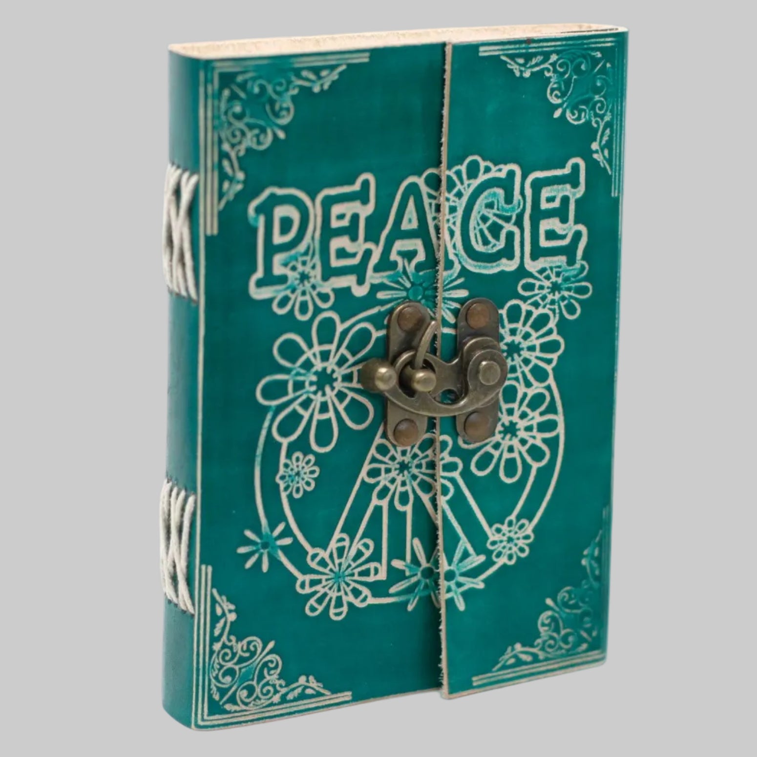 Teal book-shaped box with 'PEACE' and floral designs on a white background