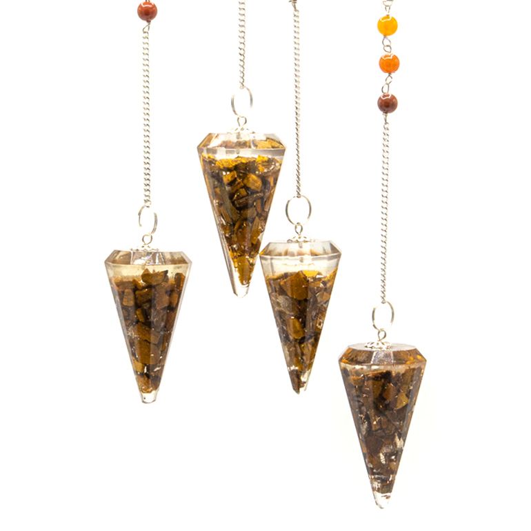 Four crystal pendulums with chains on a white background