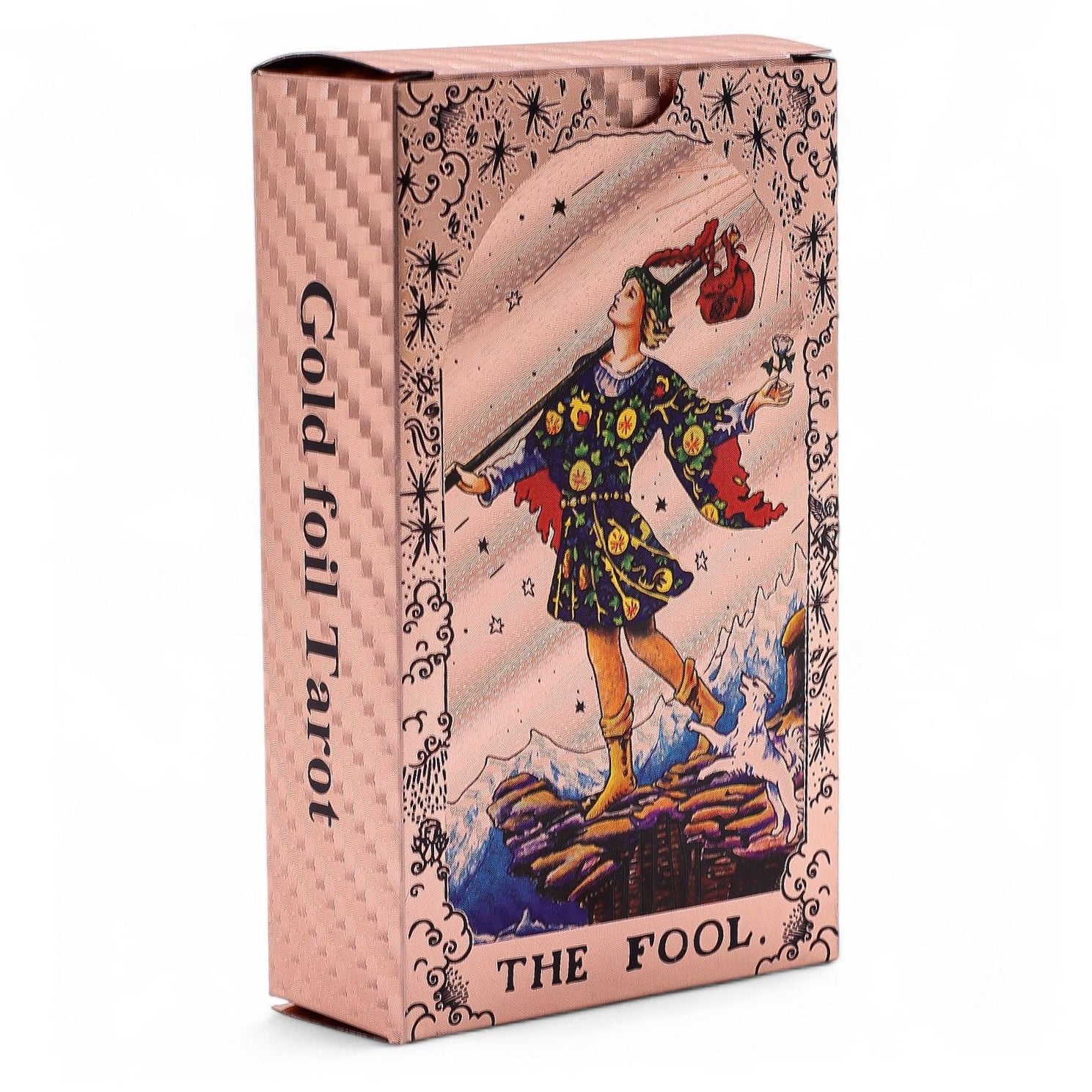 Gold foil Tarot card box featuring 'The Fool' with intricate design and text.