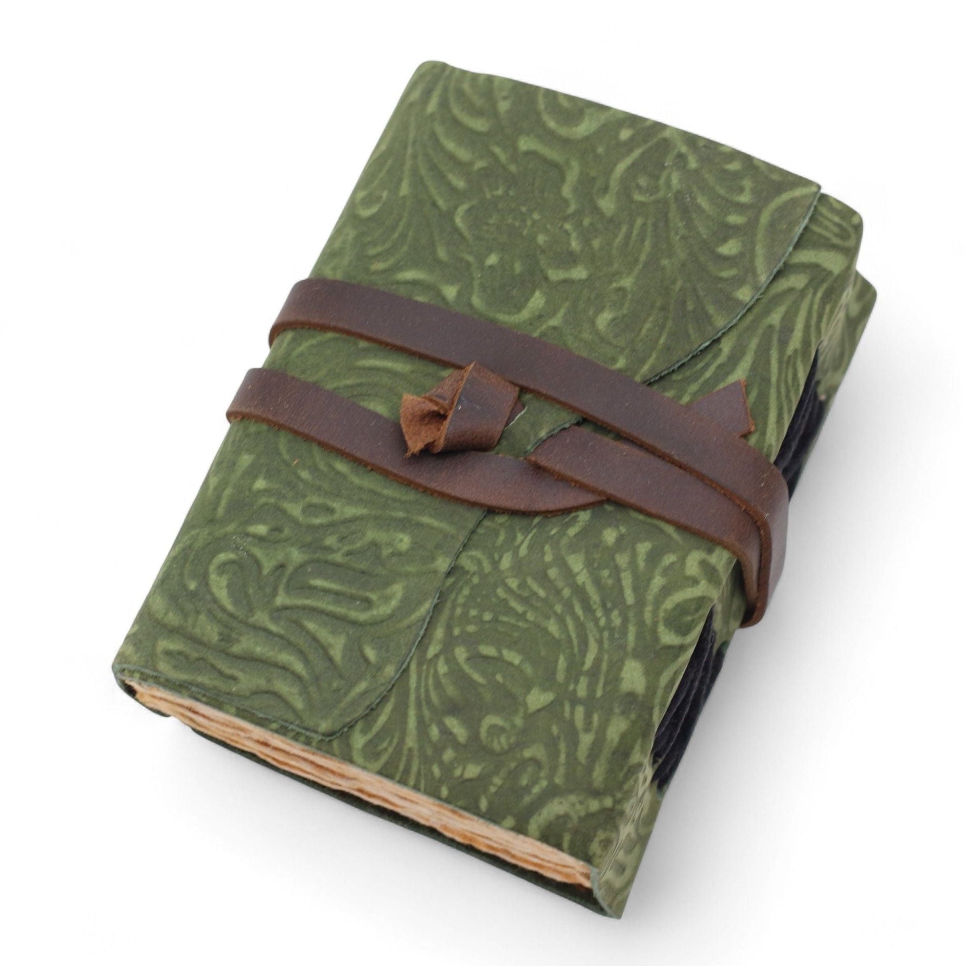 Green patterned notebook with a brown leather strap on a white background