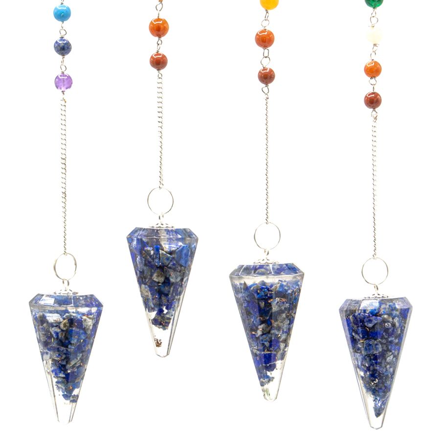 Set of four crystal pendulums with colorful beads on a white background