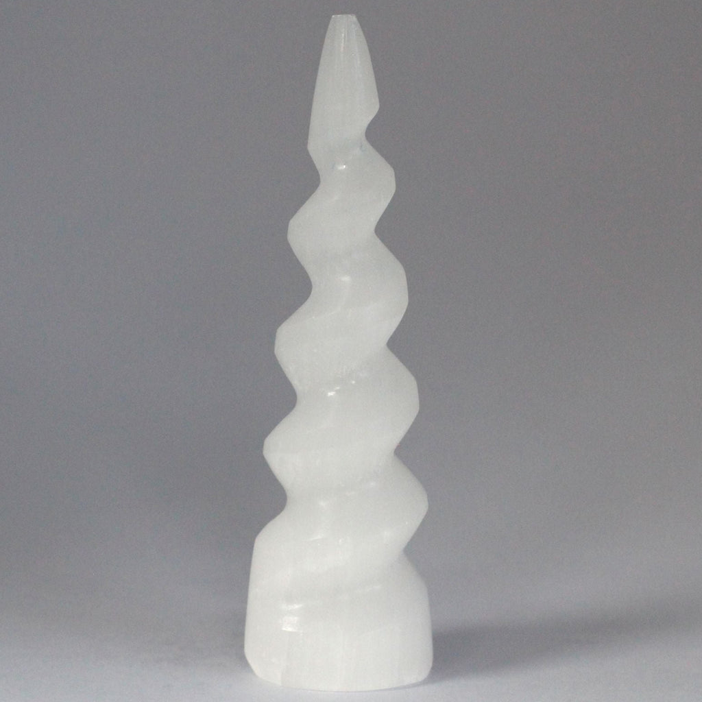 White spiral vase on a gray background