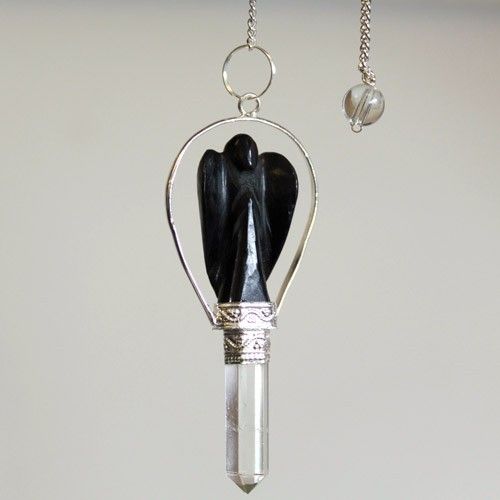 Pendant with black angel figure and crystal on a white background